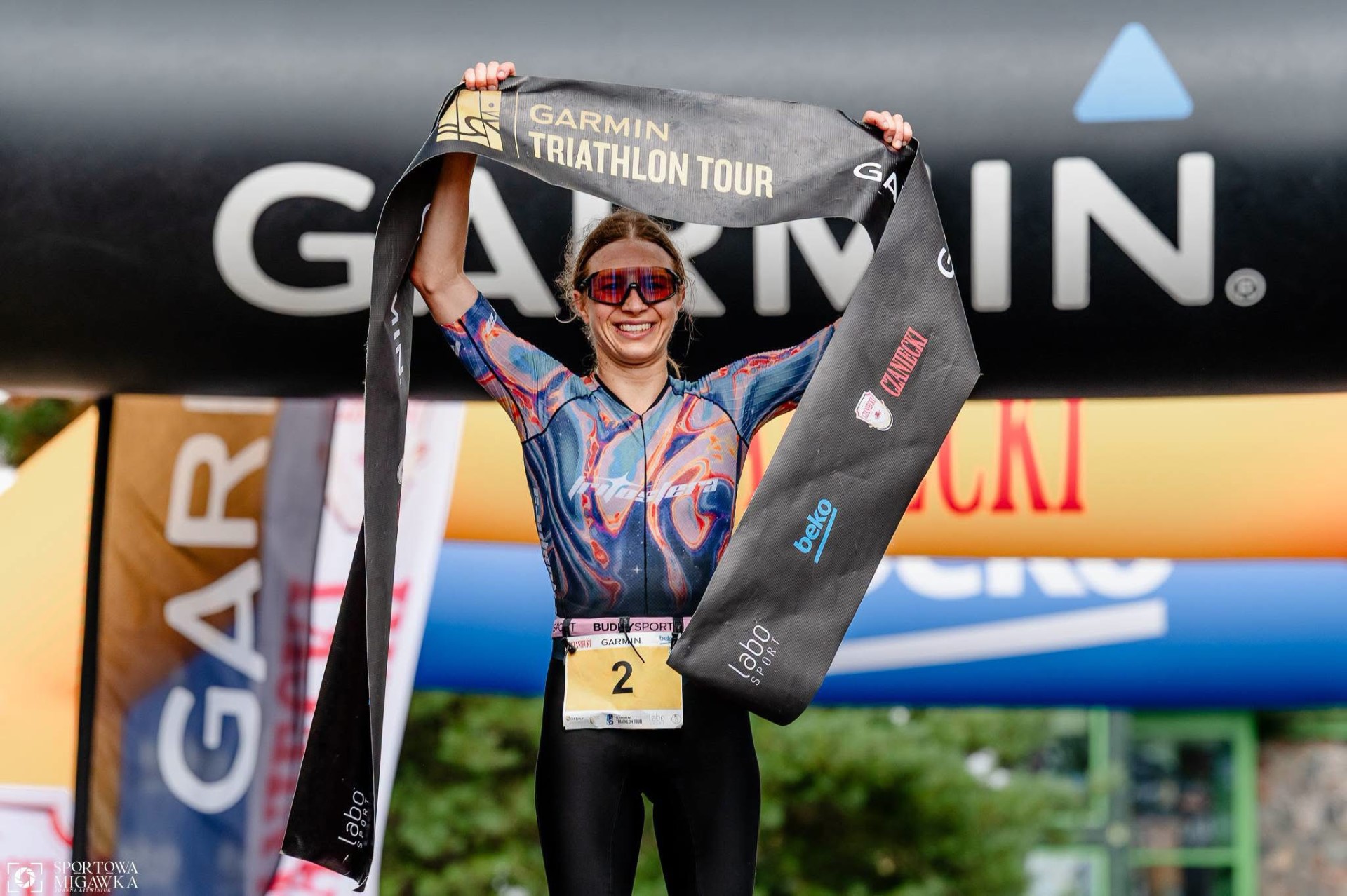 Sandra Kopiczko wins the Garmin Triathlon Tour in an INONI wetsuit